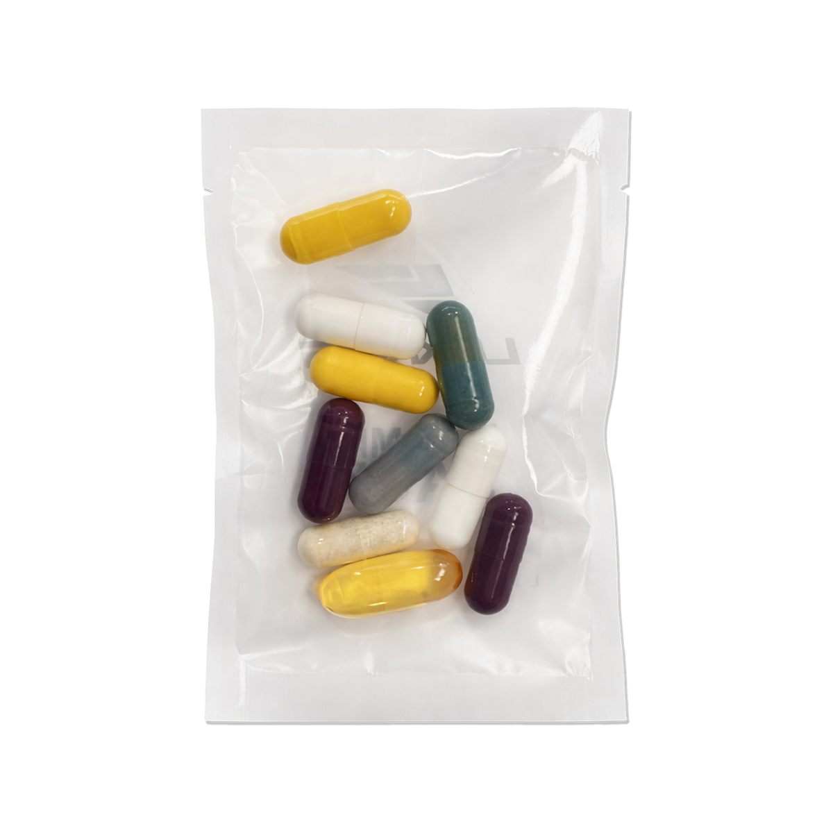 Assorted supplement capsules and pills in a clear resealable vitamin pack sachet